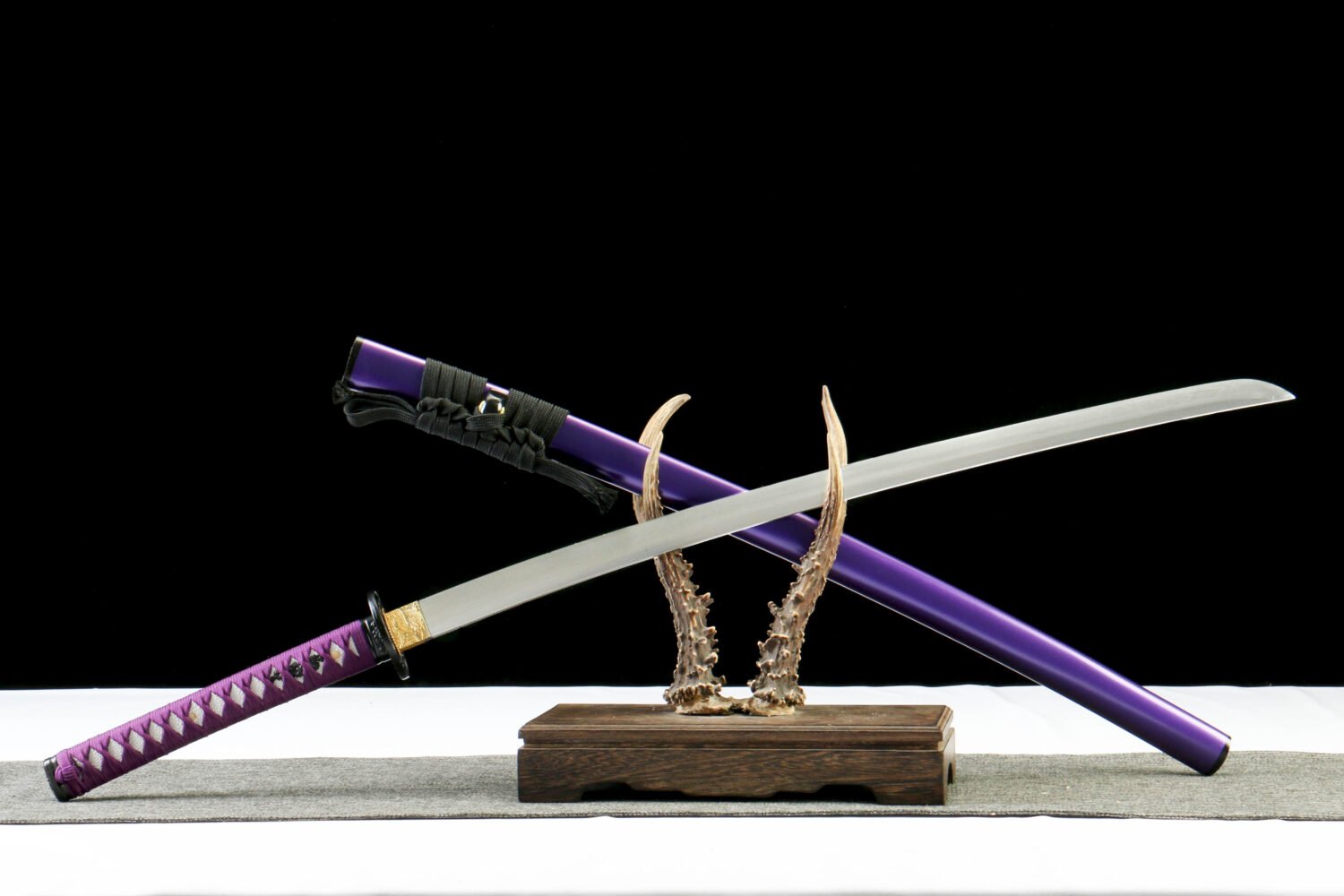 IMG_9960 T10 steel - pure handmade Japanese samurai sword - earth-covered burnt blade - green leather sheath - purple