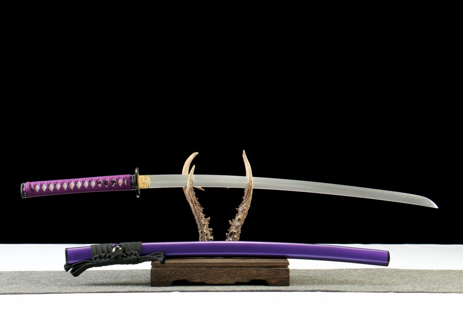 IMG_9965 T10 steel - pure handmade Japanese samurai sword - earth-covered burnt blade - green leather sheath - purple